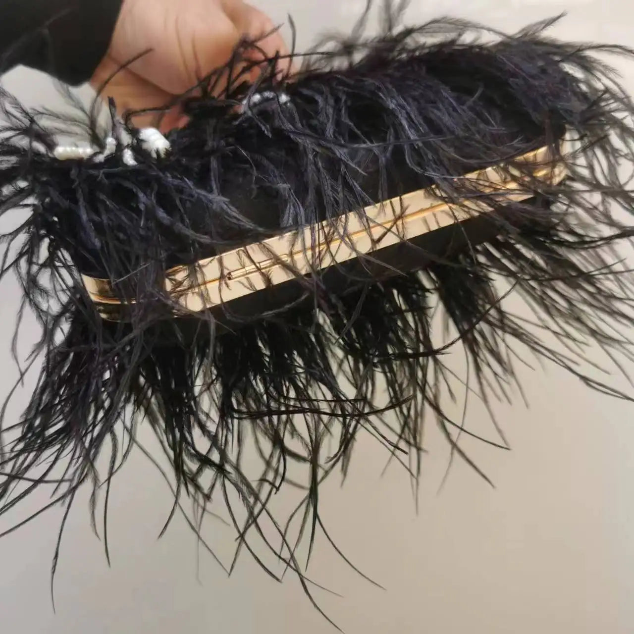 The Feather Clutch Bag