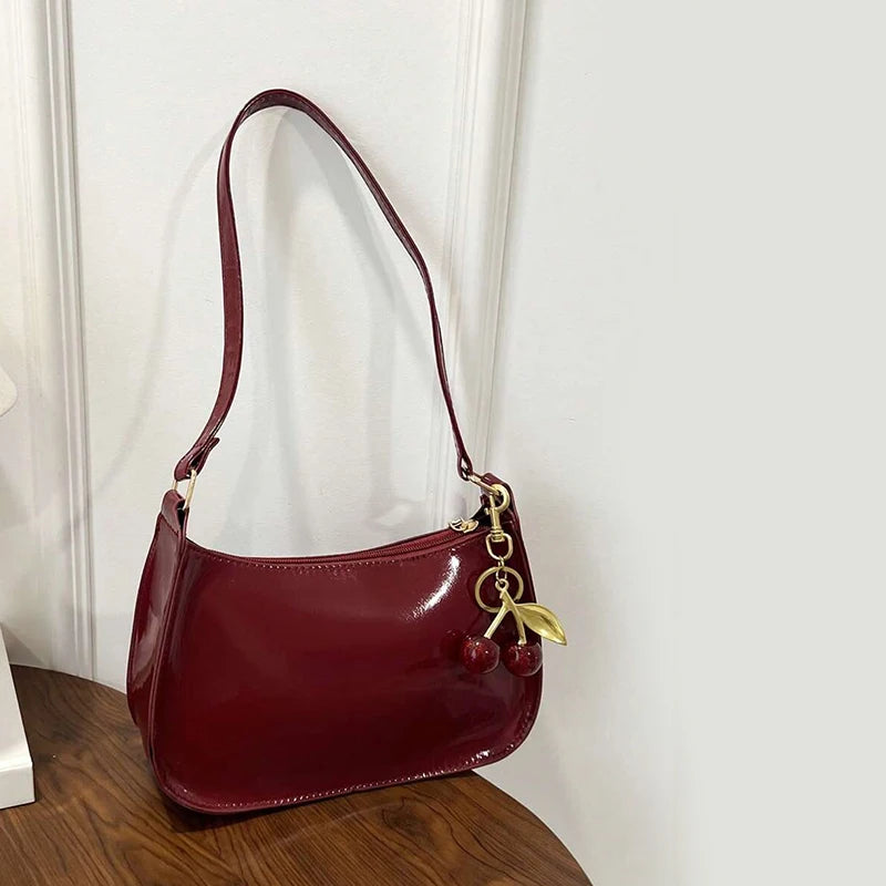 Women's PU Leather Handbag Versatile Fashion Solid Color Cherry Pendant Shoulder Bag Casual Commuting Bag Girl Underarm Bag