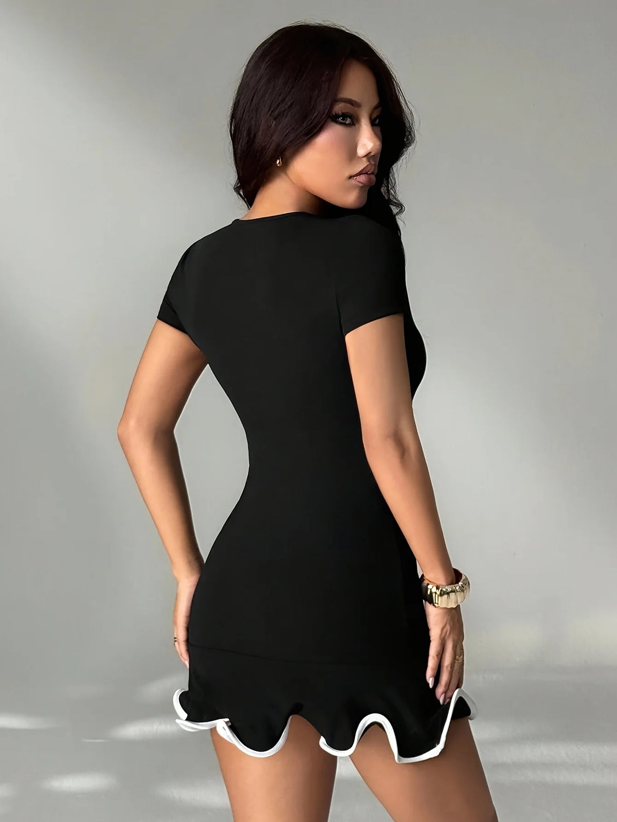 The Ruffled Slim-Fit Mini Dress
